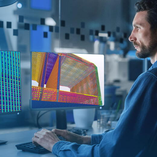 Insinyur sedang mengerjakan model rebar Tekla yang kompleks