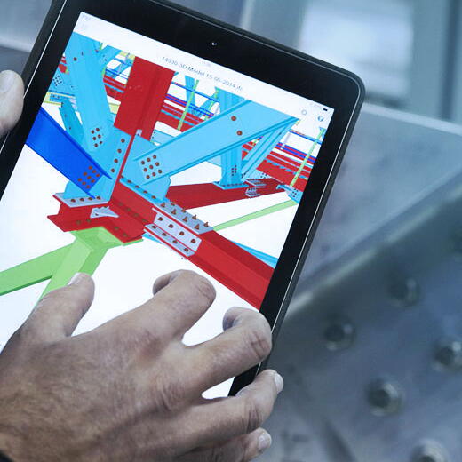 Steel model on tablet viewed at shop floor