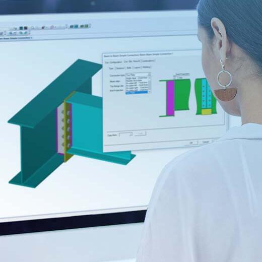 Engineer working with Tekla Connection Designer in office