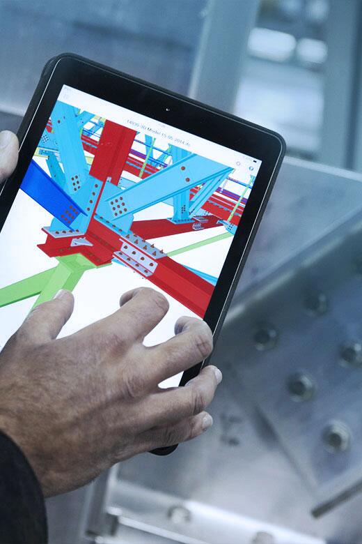 Steel model on tablet viewed at shop floor