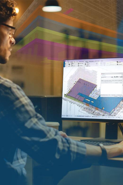 Ingeniero utiliza el software de Tekla para los cálculos a partir de modelos