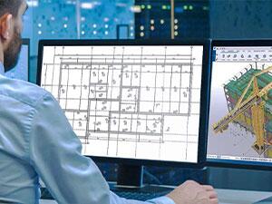 engineer working on Tekla Structures on a computer