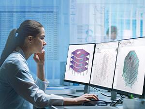 Engineer analyzing and designing building with Tekla