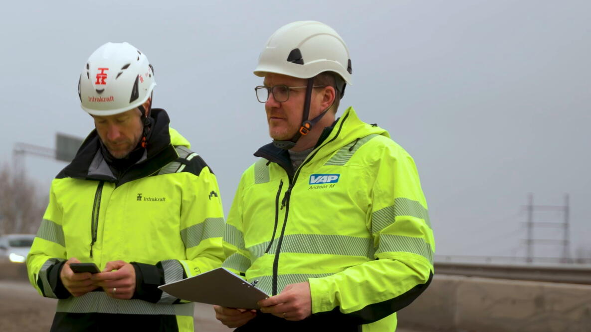 View of project members from the Eskilstuna infrastructure project discussing details onsite.